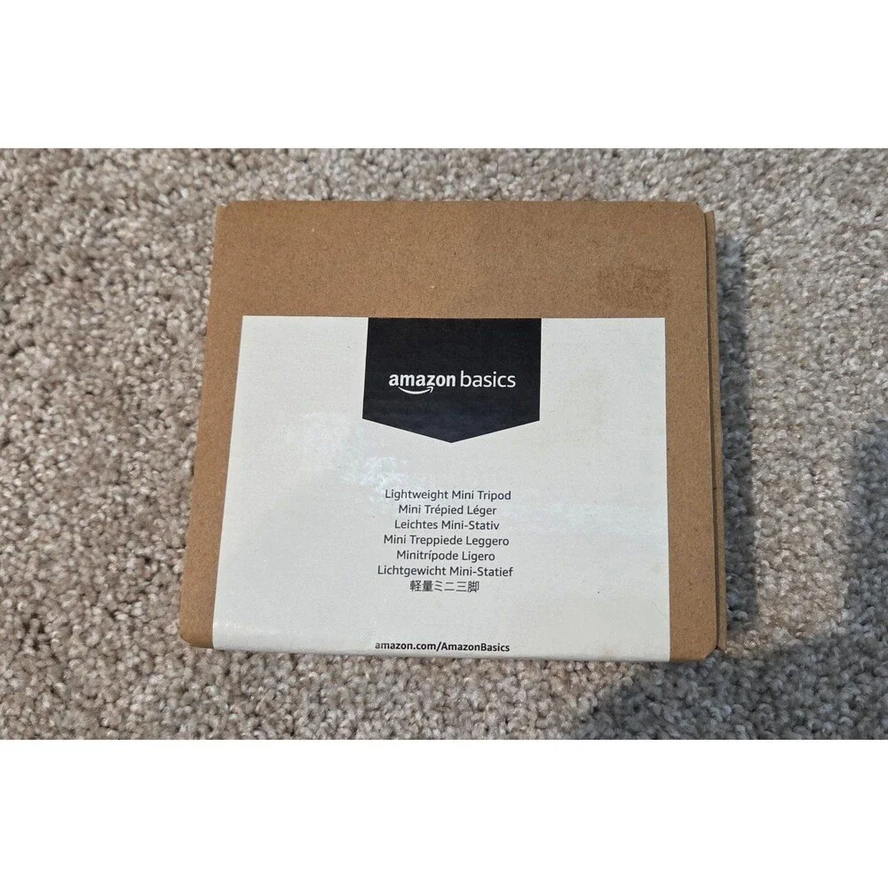 Amazon Basics Lightweight Portable Mini Travel Tripod with 360° Ball Head
